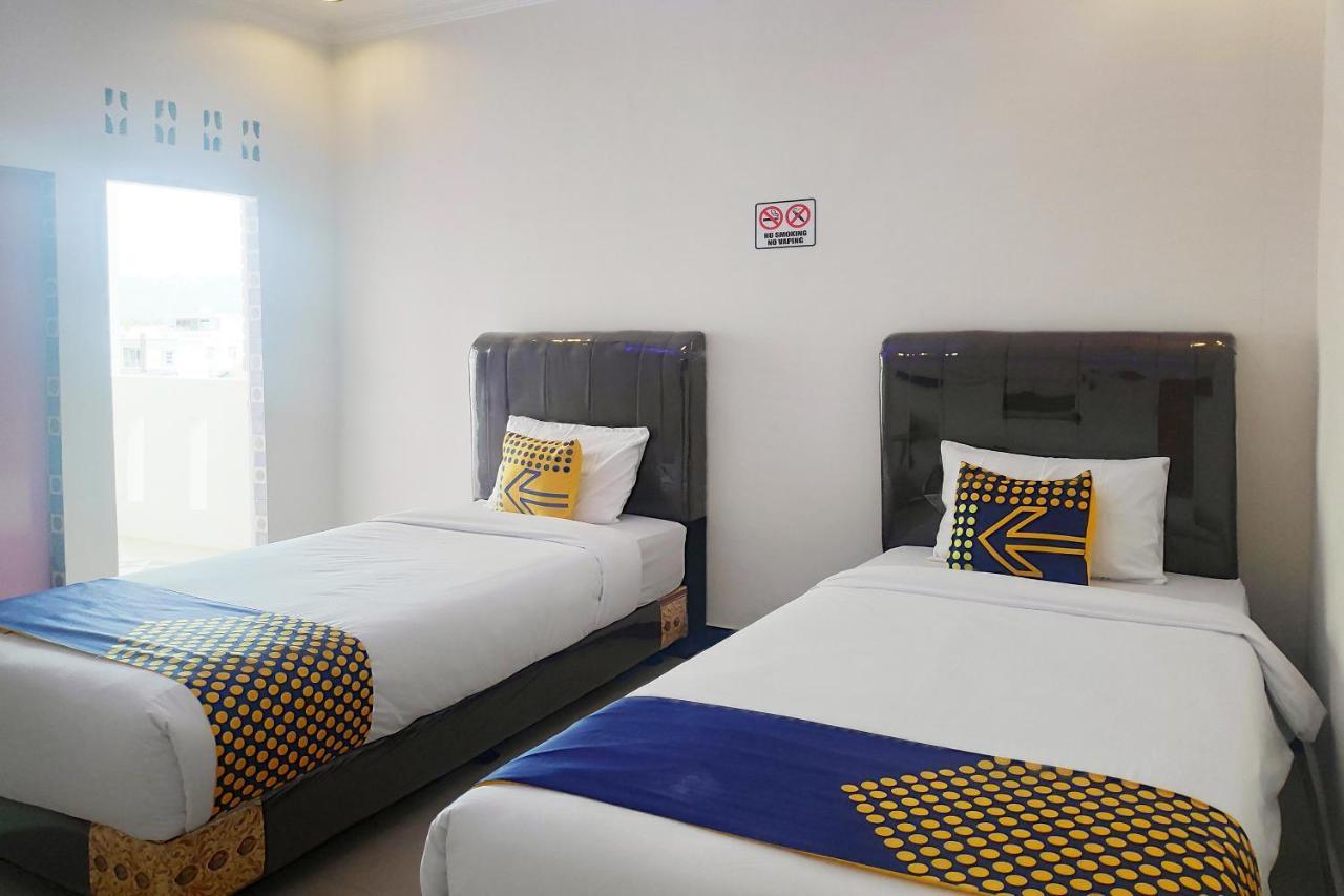 Oyo 2220 Pink'S Guest House Tarutung Экстерьер фото